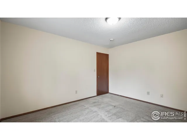 a black and white photo of a living room