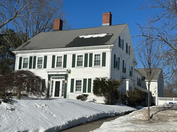 a front view of a building with street view