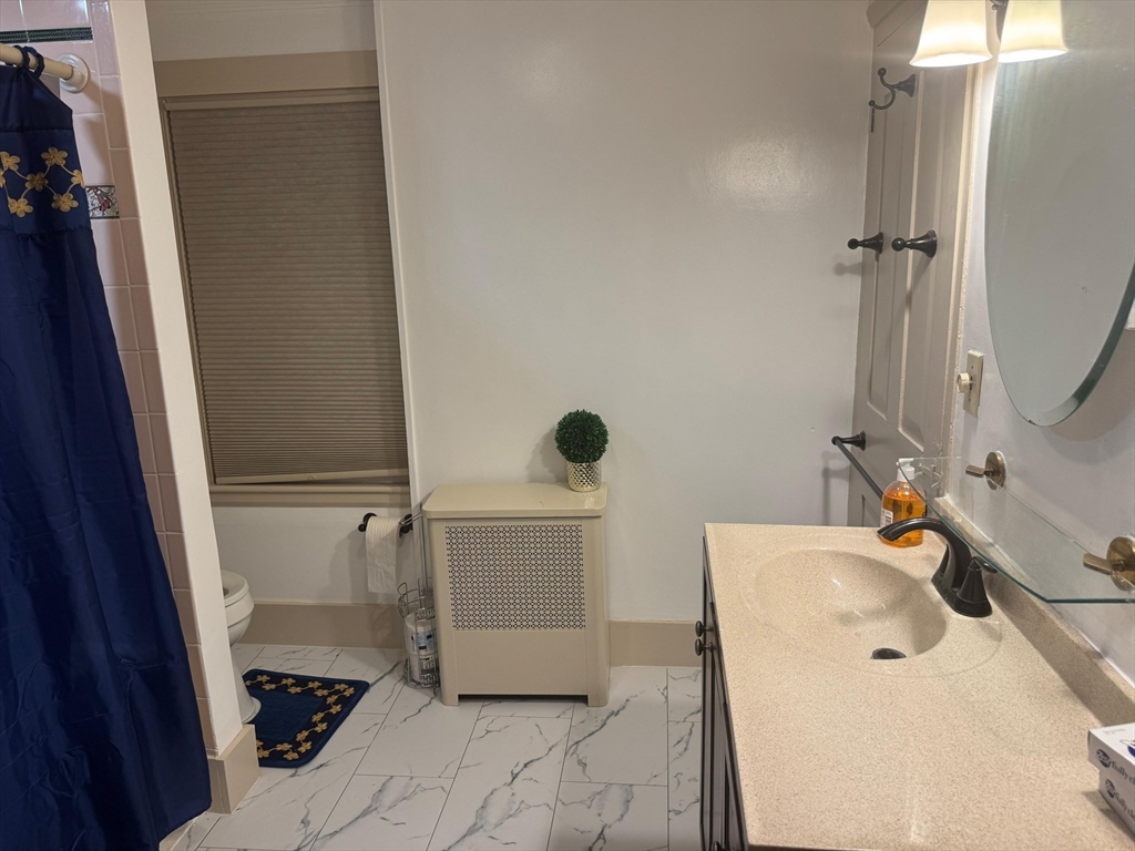 367 Maple Street, Unit MULTIFAMLY Danvers, MA 01923 - Photo 12 of 26 a bathroom with a sink