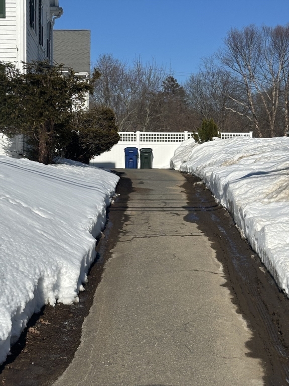 367 Maple Street, Unit MULTIFAMLY Danvers, MA 01923 - Photo 19 of 26 a view of a yard with iron fence