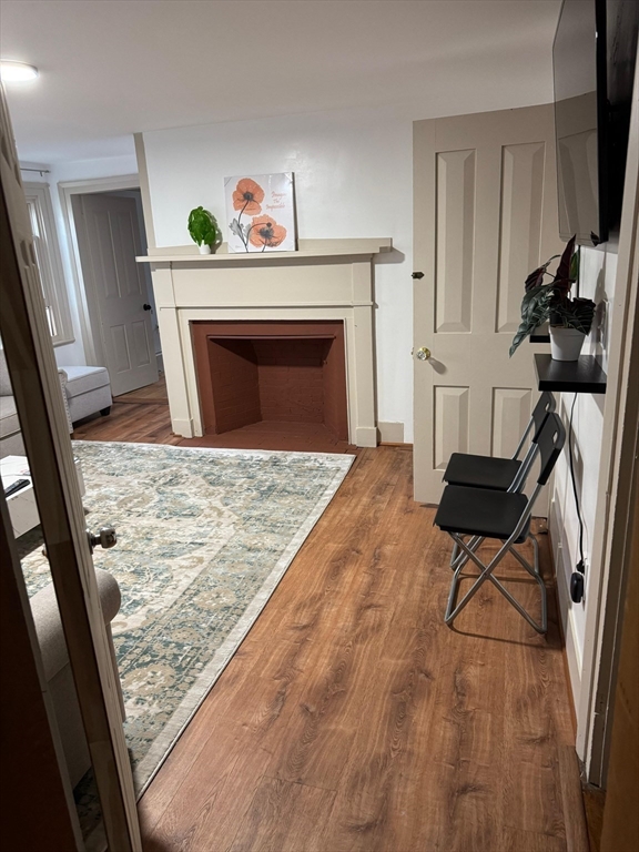 367 Maple Street, Unit MULTIFAMLY Danvers, MA 01923 - Photo 9 of 26 a living room with a fireplace