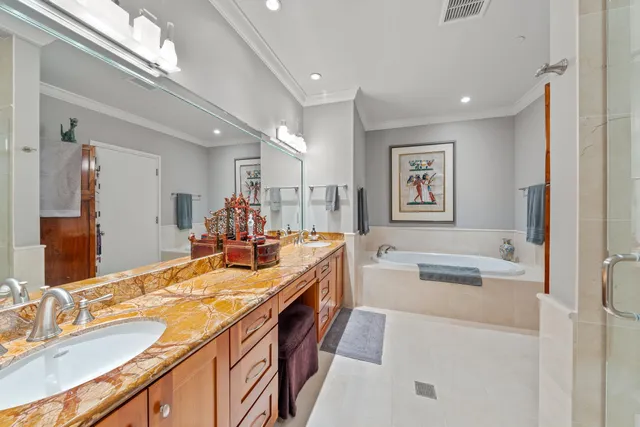 a kitchen with kitchen island a sink appliances and cabinets