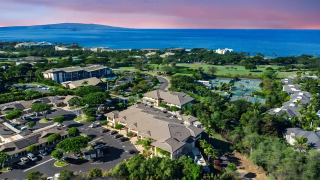 an aerial view of a house with a garden