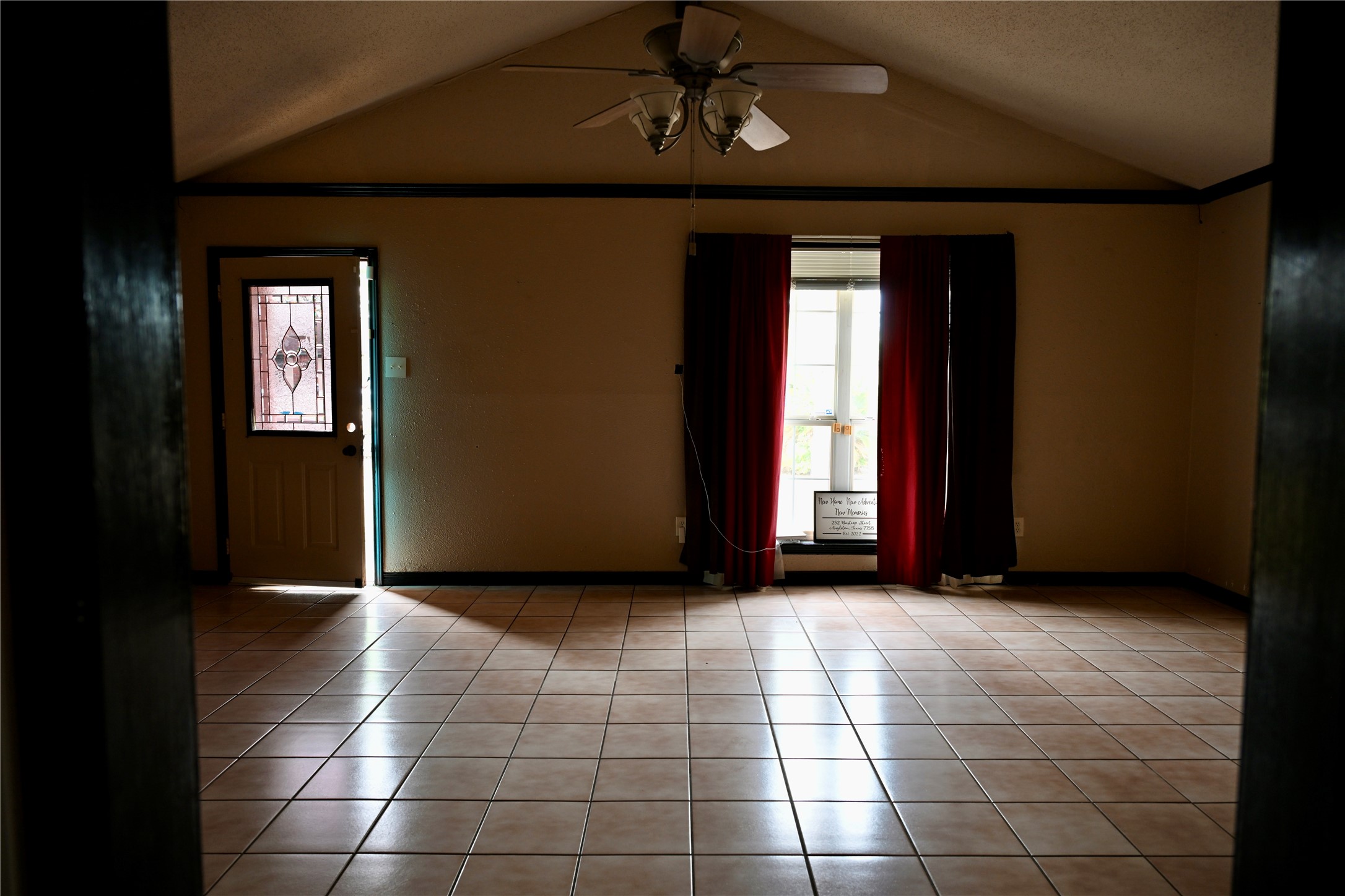 252 Bastrop Street Angleton, TX 77515 - Photo 11 of 28 a view of an empty room with window and bathroom