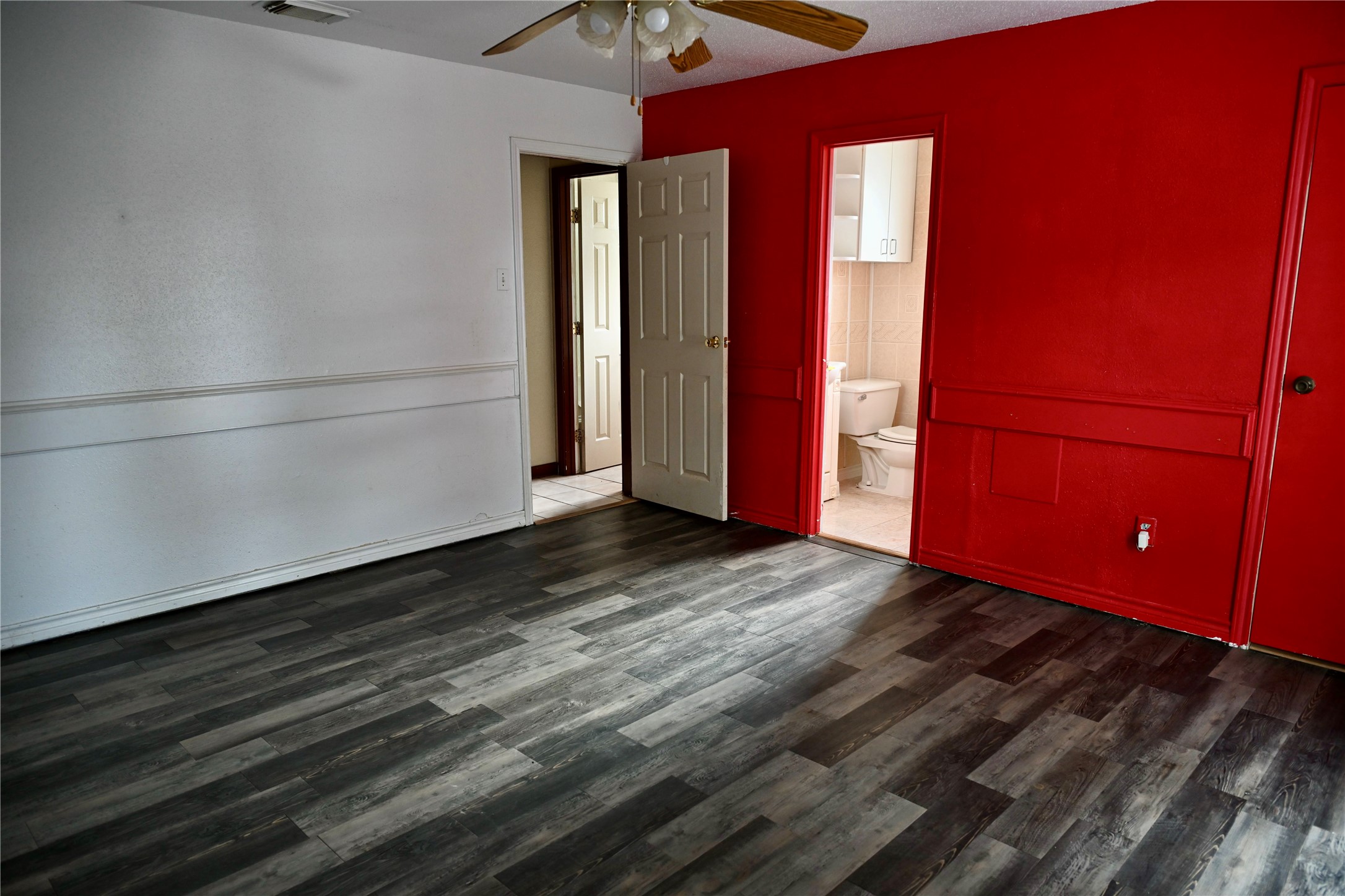 252 Bastrop Street Angleton, TX 77515 - Photo 25 of 28 a view of a room with wooden floor