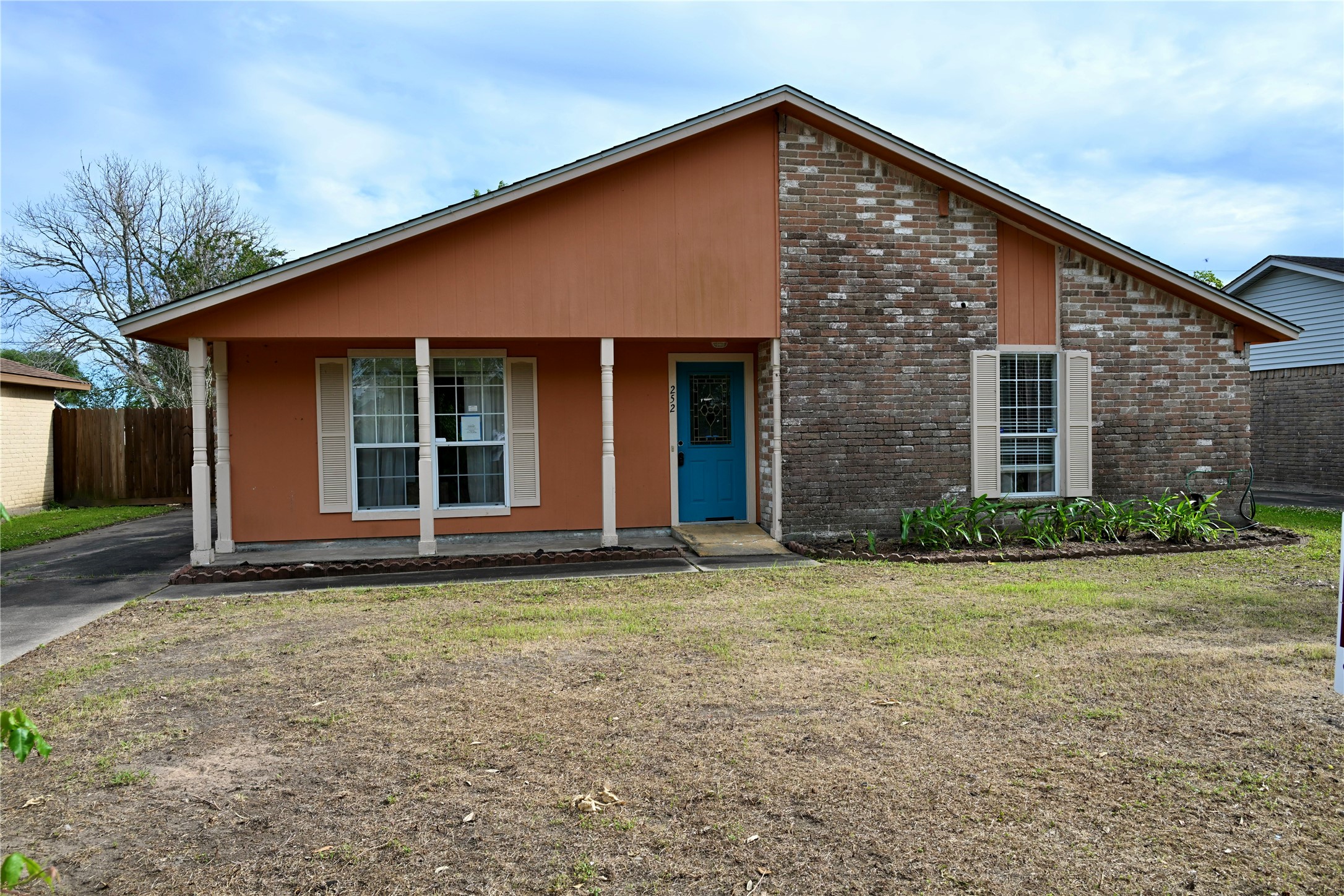 252 Bastrop Street Angleton, TX 77515 - Photo 3 of 28 a view of a house with backyard and garden