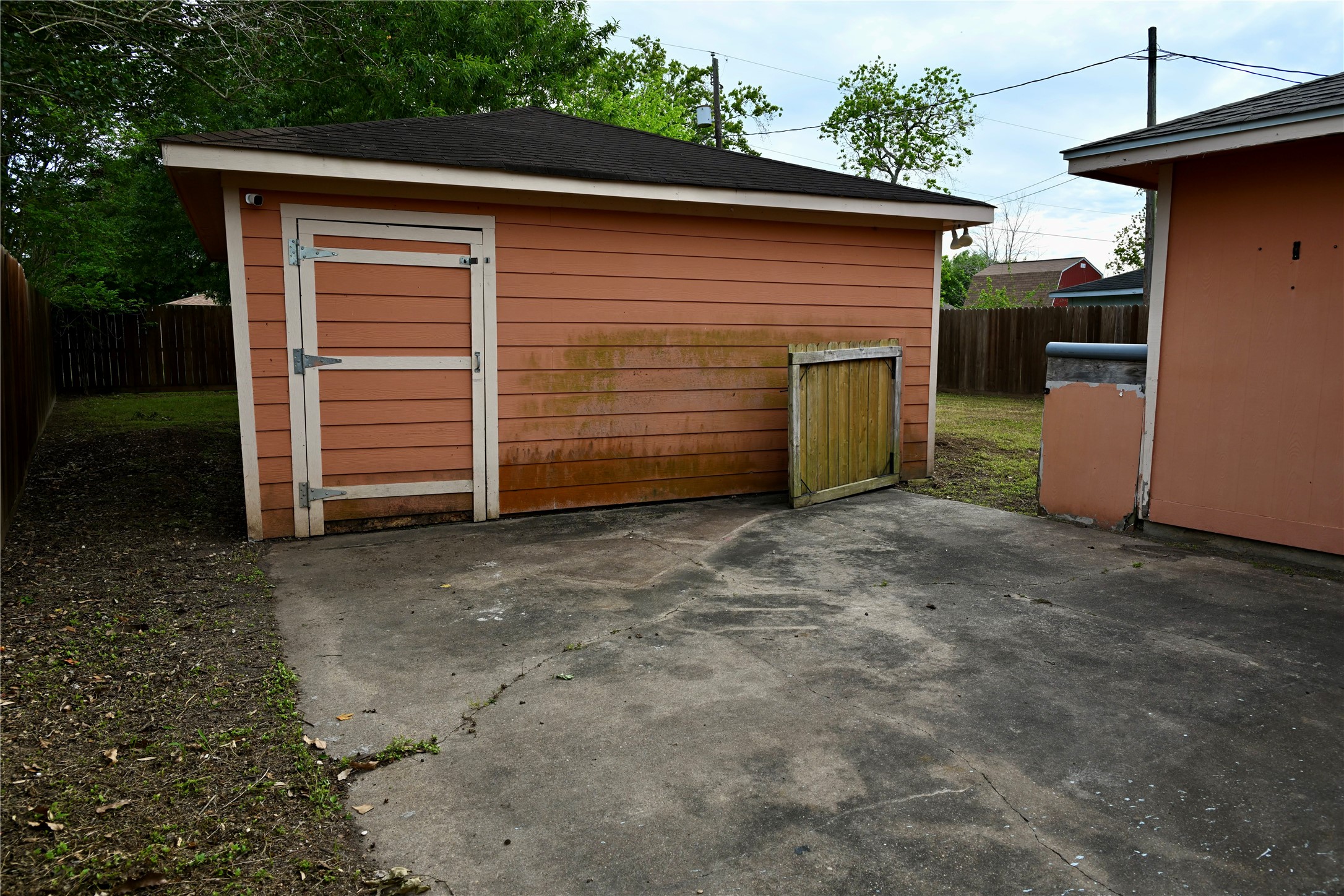 252 Bastrop Street Angleton, TX 77515 - Photo 8 of 28 a view of outdoor space and garage