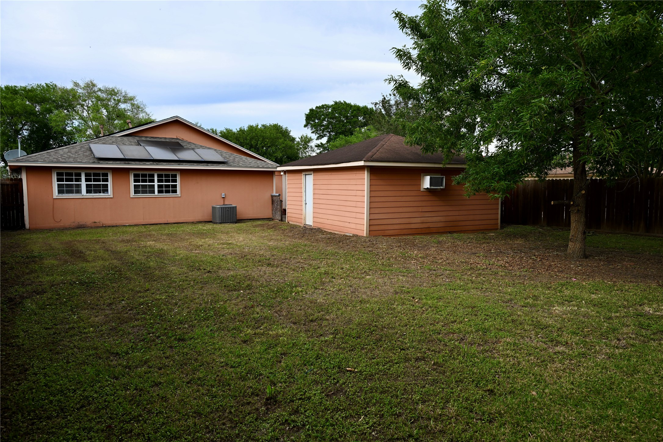 252 Bastrop Street Angleton, TX 77515 - Photo 9 of 28 a view of a house with a yard