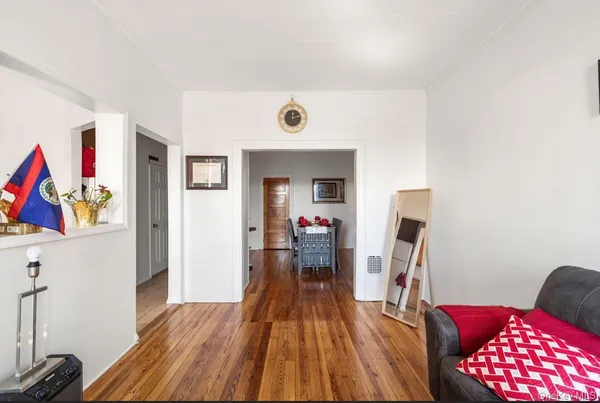 a view of entryway with wooden floor