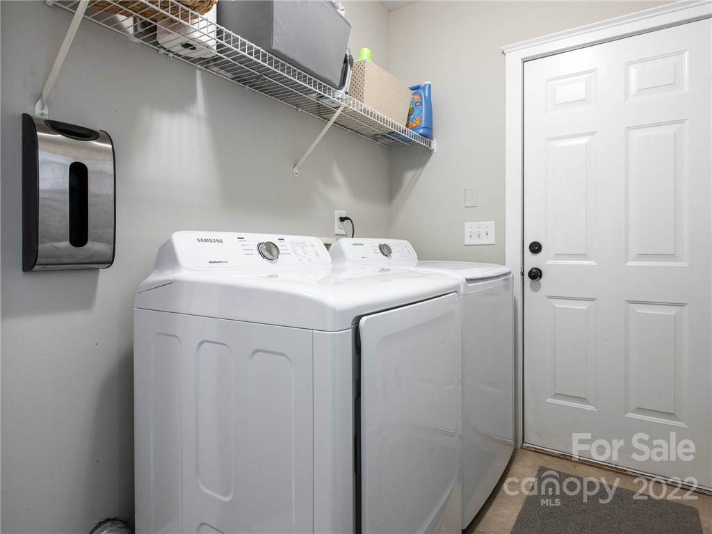 5725 Coopers Ridge Lane Charlotte, NC 28269 - Photo 26 of 39 a utility room with dryer and washer