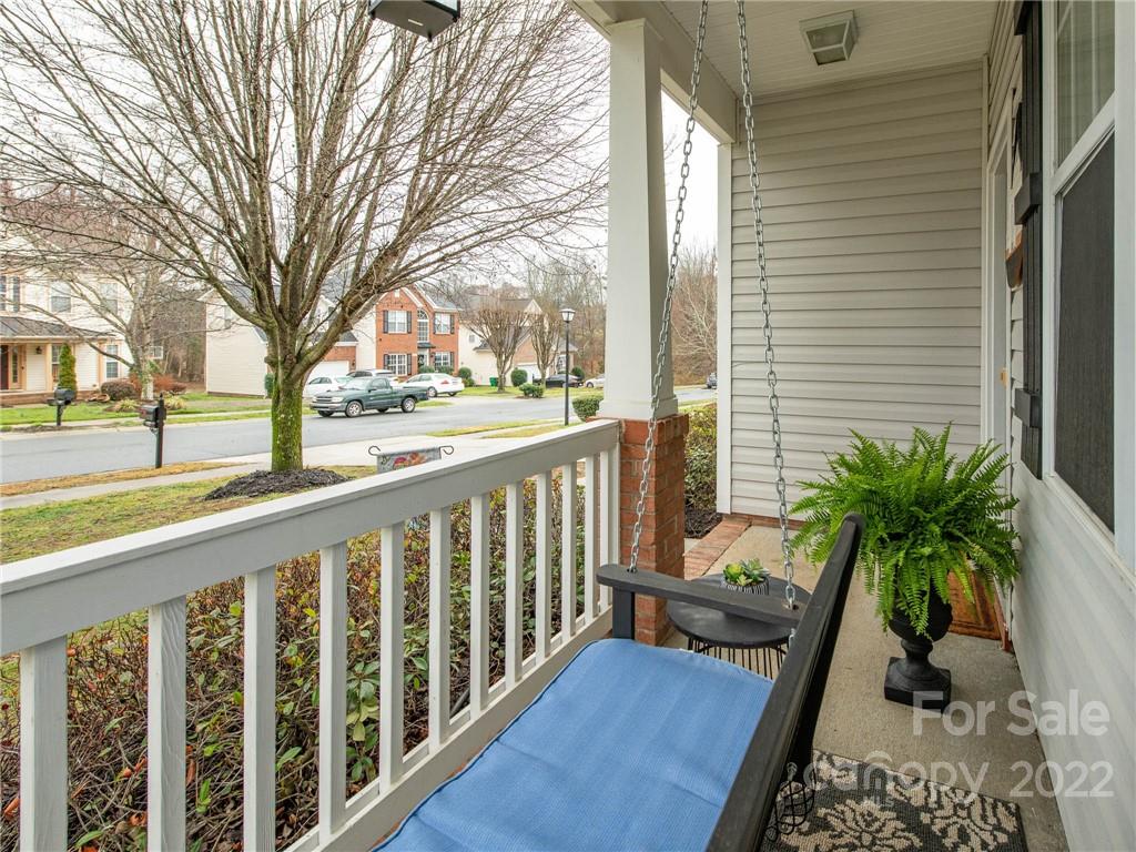 5725 Coopers Ridge Lane Charlotte, NC 28269 - Photo 5 of 39 a view of balcony with wooden floor and fence