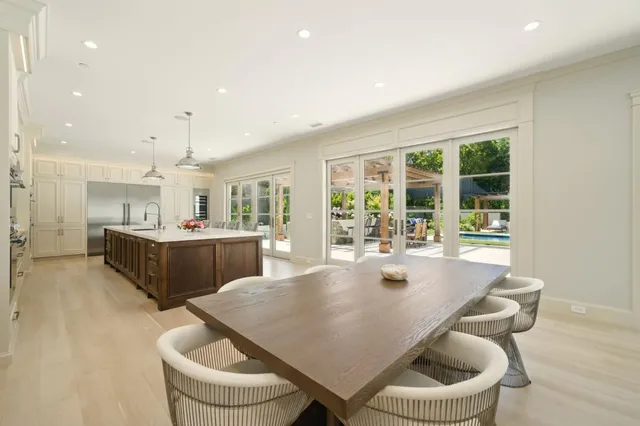 a spacious bedroom with a bed and a couch