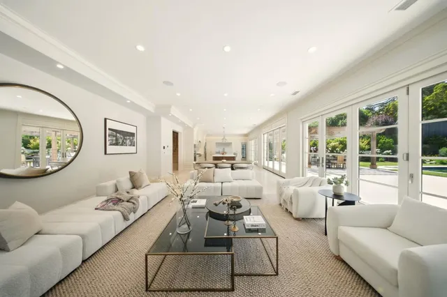 a bathroom with a sink toilet a shower and a mirror