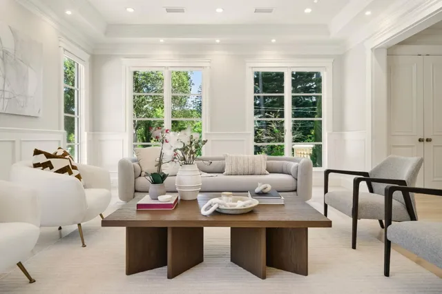 a view of green field with plants and trees