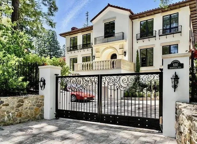 a kitchen with stainless steel appliances a sink stove and cabinets
