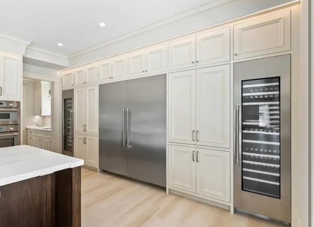 a bathroom with a sink a mirror and a toilet