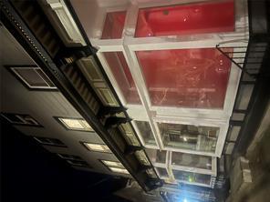 a view of building with wooden floor