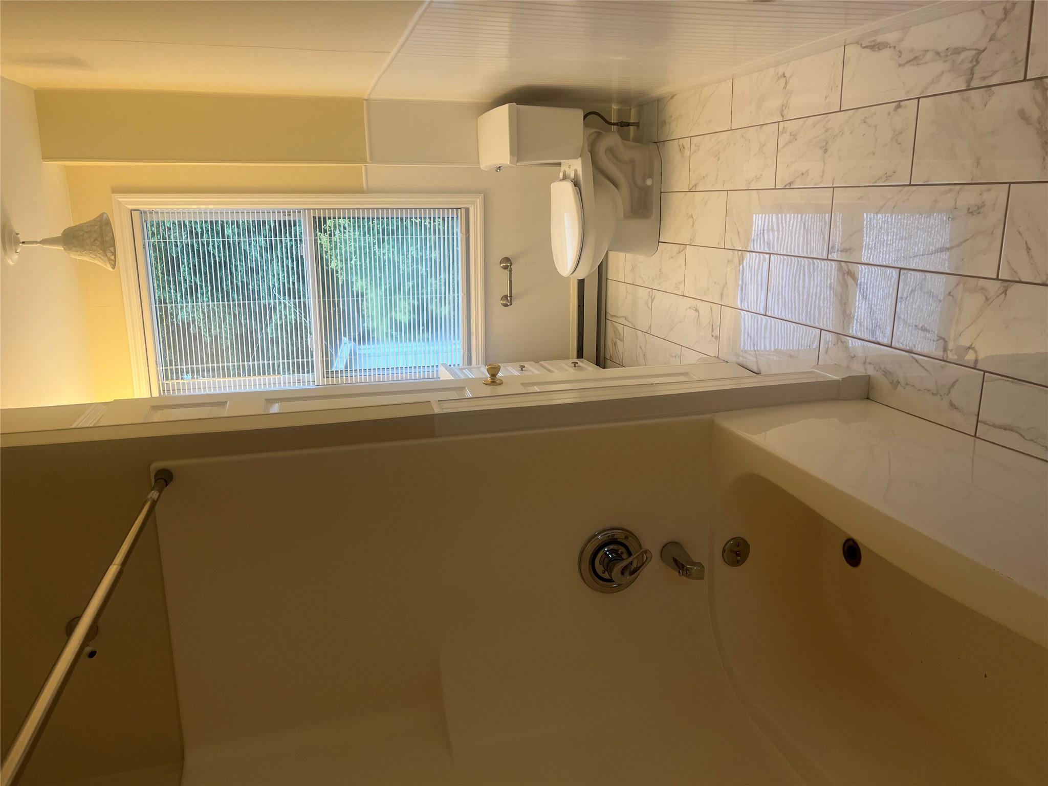 161 Main Street Cold Spring, NY 10516 - Photo 7 of 8 a bathroom with a bathtub and a shower