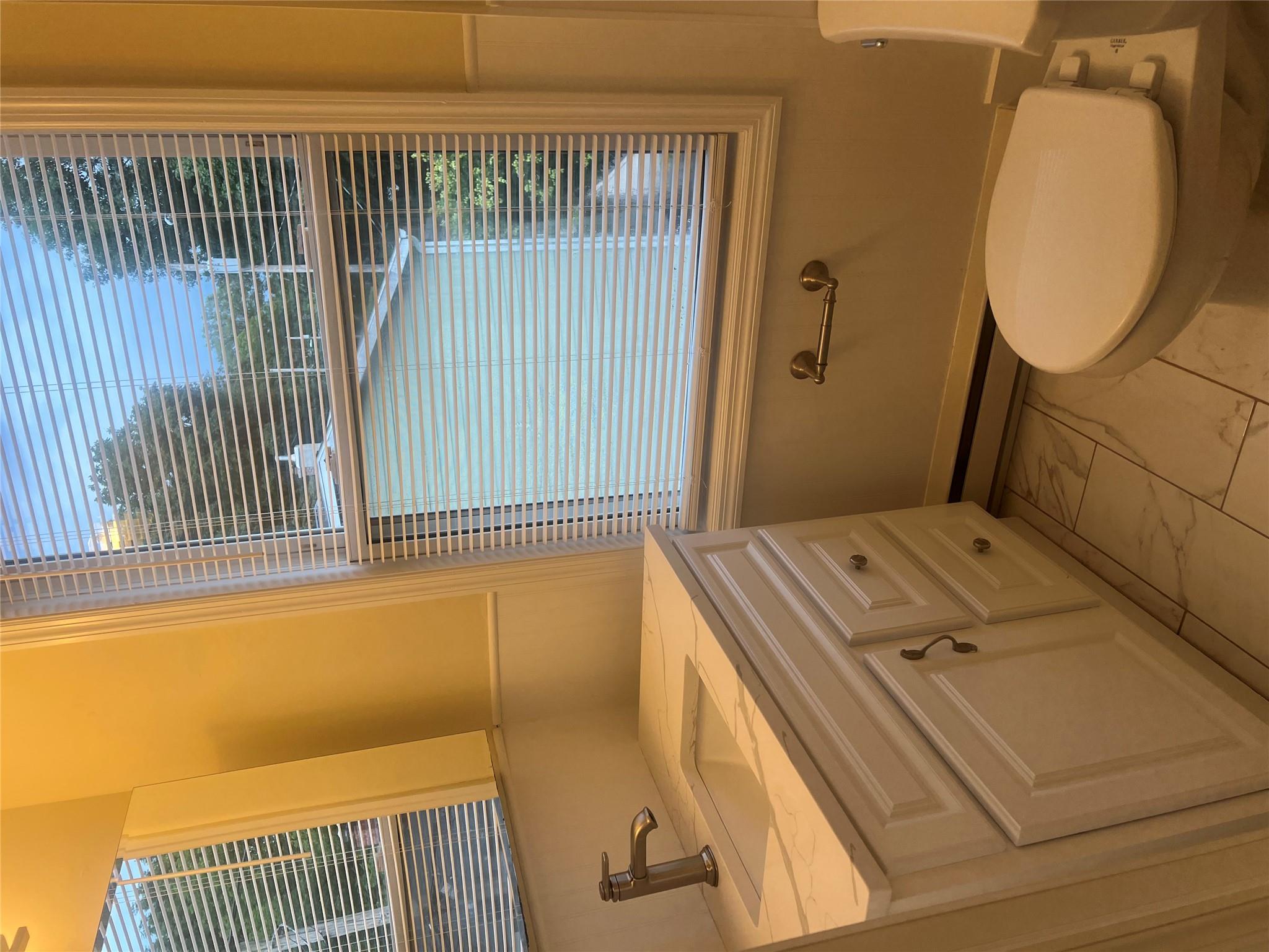 161 Main Street Cold Spring, NY 10516 - Photo 8 of 8 a bathroom with a sink and a mirror