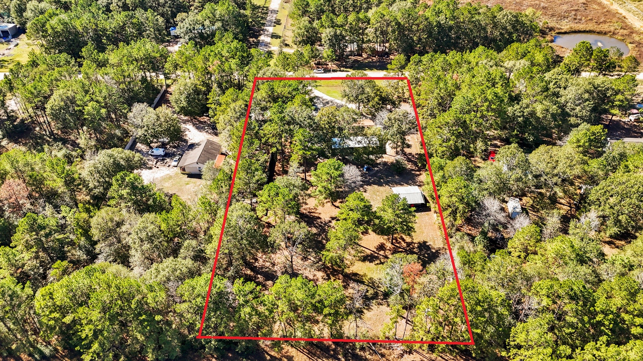 180 Butler Drive Cleveland, TX 77328 - Photo 5 of 23 This aerial view showcases the massive 65,253 sqft Lot!