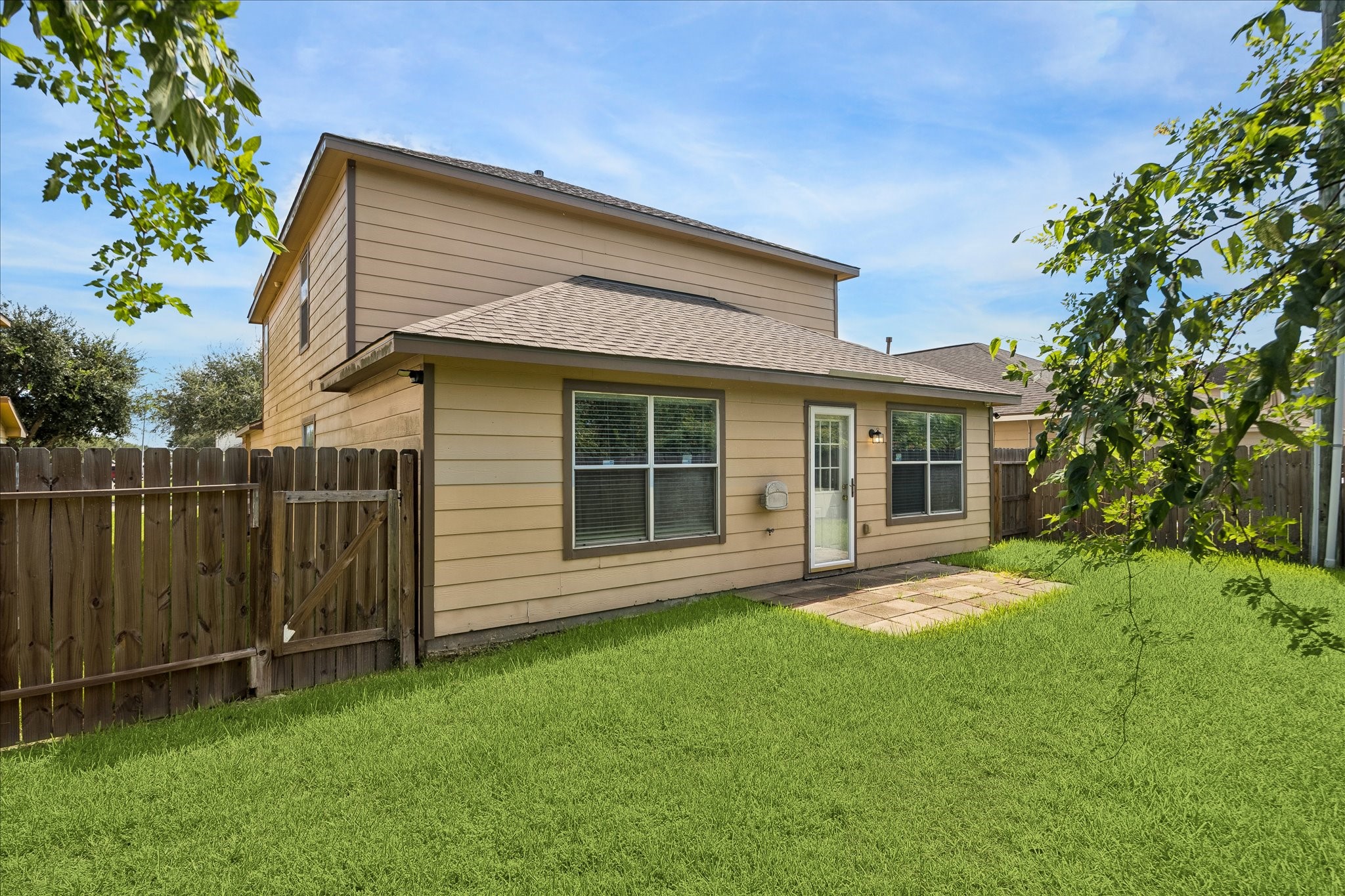 223 Sunset Colony Drive Rosharon, TX 77583 - Photo 48 of 50 Step outside to a spacious backyard with room to grow, play and create the outdoor setup you’ve been dreaming about, all tucked into a quiet cul-de-sac setting with no rear neighbors.