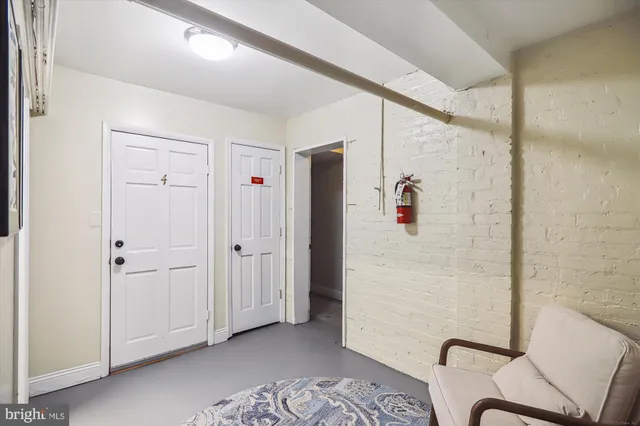 a bathroom with a shower and a sink