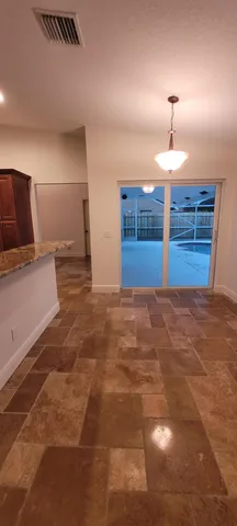 a view of a livingroom with a staircase