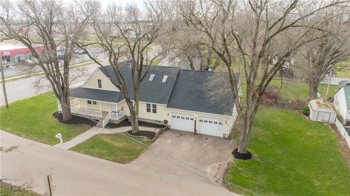 8240 Looney Road Piqua, OH 45356 - Photo 5 of 49 This charming home offers a spacious private yard and a generous driveway, perfect for comfortable living.