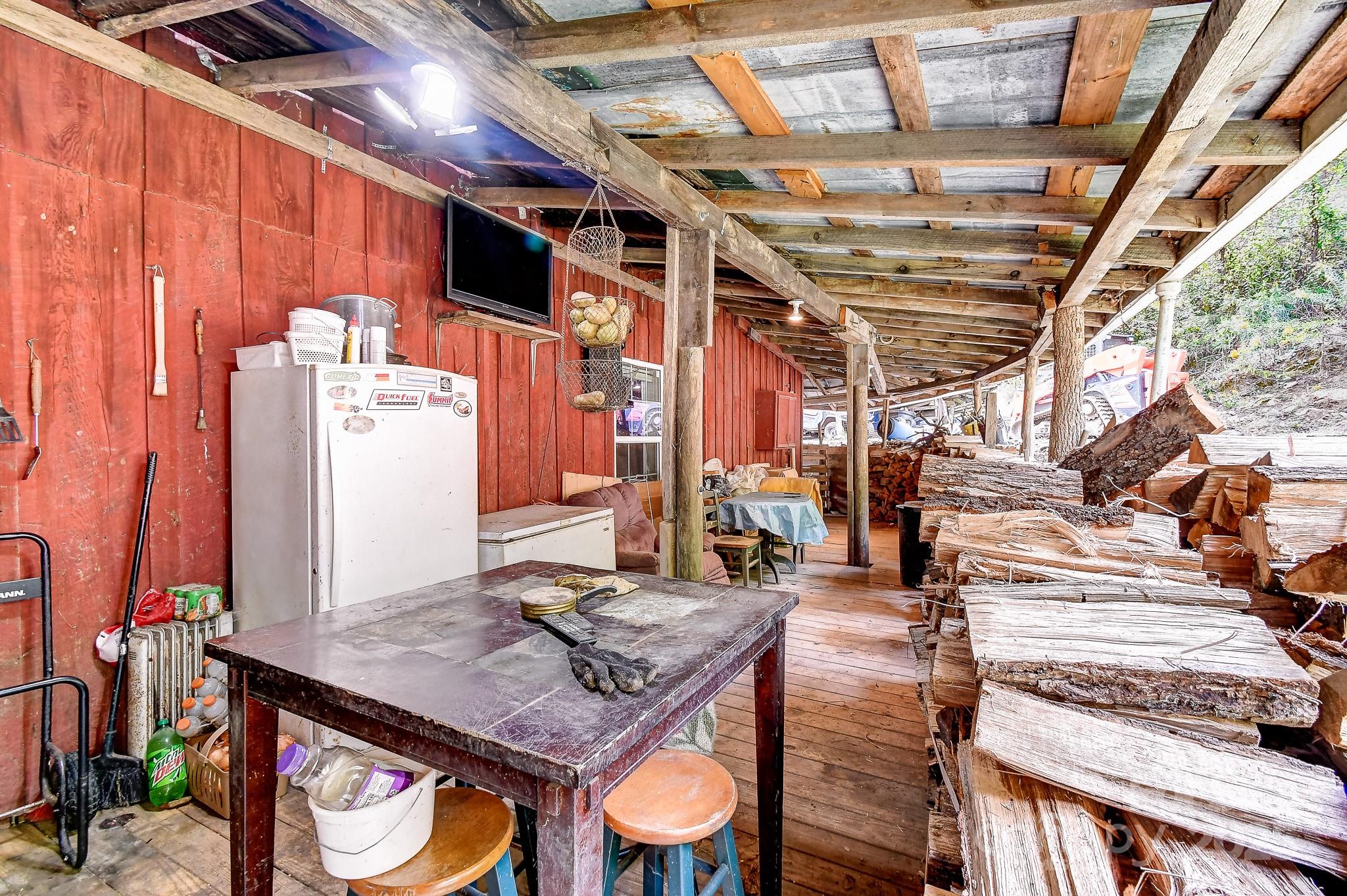 105 Home Place Road Maggie Valley, NC 28751 - Photo 20 of 24 a view of a patio with table and chairs