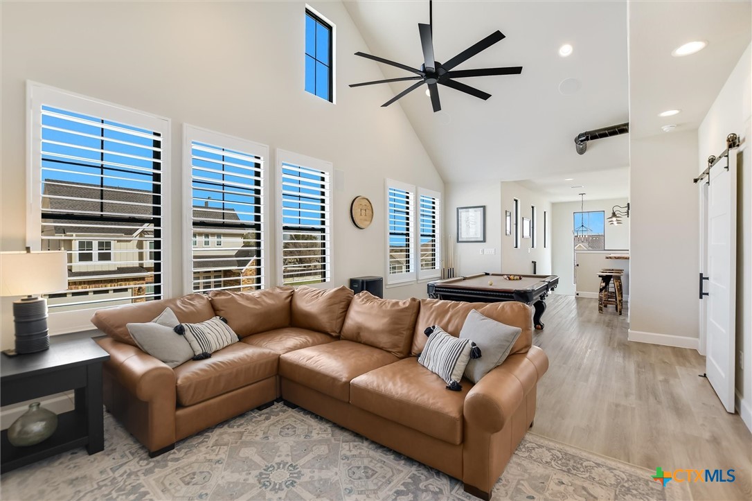 105 Retreat Place Georgetown, TX 78626 - Photo 14 of 42 a living room with furniture and a large window