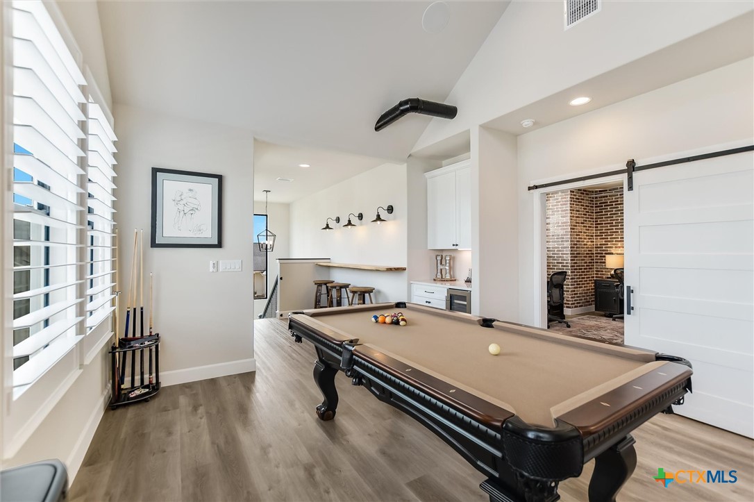 105 Retreat Place Georgetown, TX 78626 - Photo 16 of 42 a room with pool table and windows