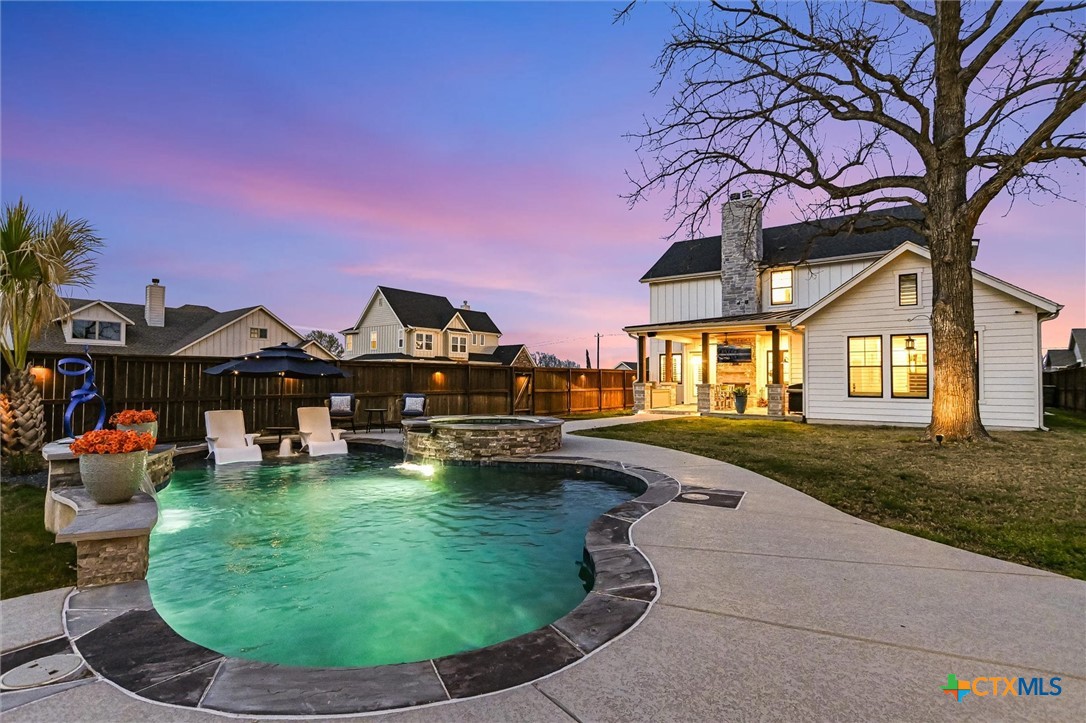 105 Retreat Place Georgetown, TX 78626 - Photo 36 of 42 a view of a house with swimming pool and sitting area