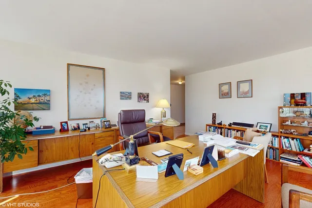 a view of a workspace with furniture