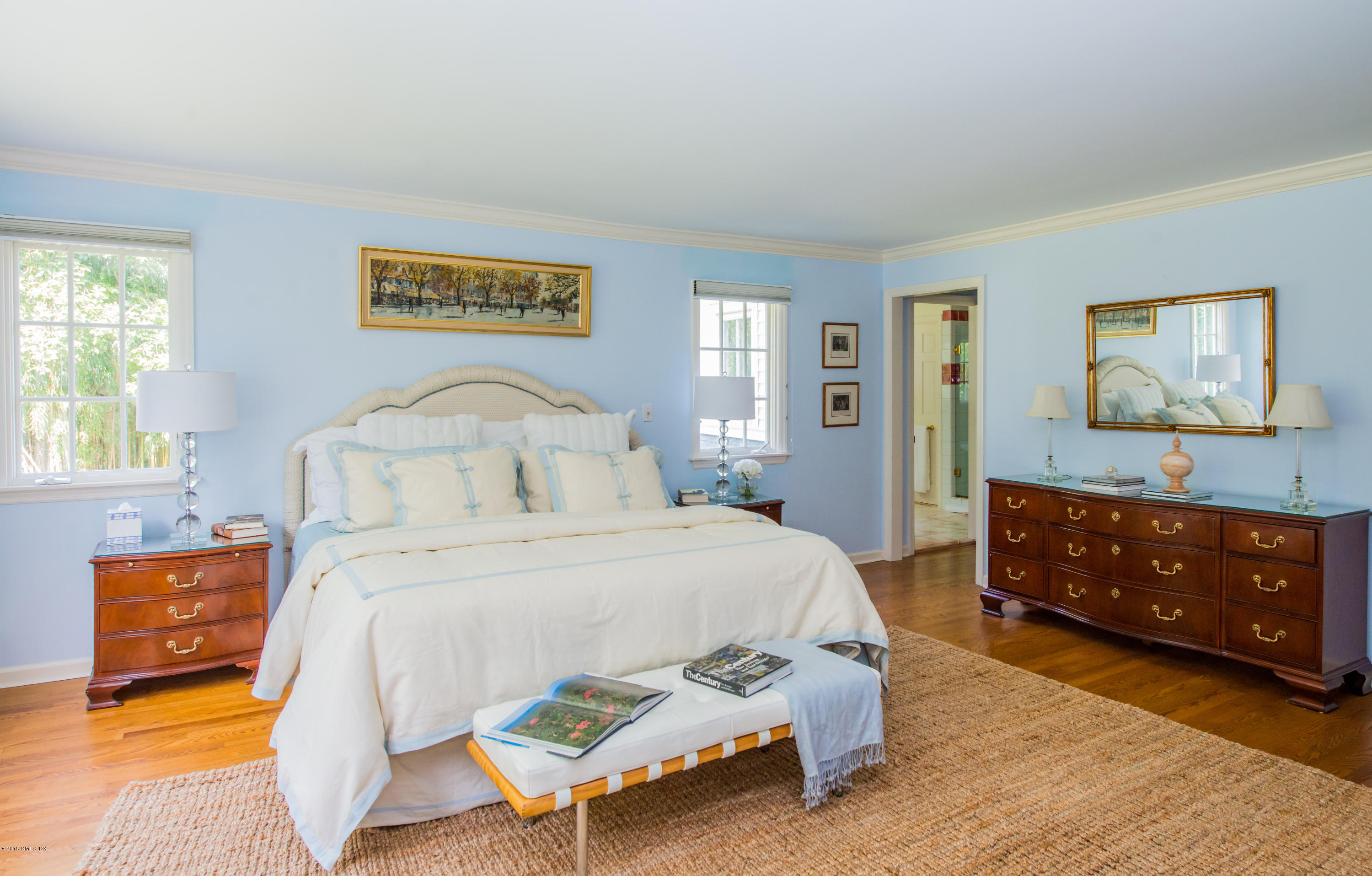 82 Butternut Hollow Road Greenwich, CT 06830 - Photo 15 of 29 a bedroom with a bed and window