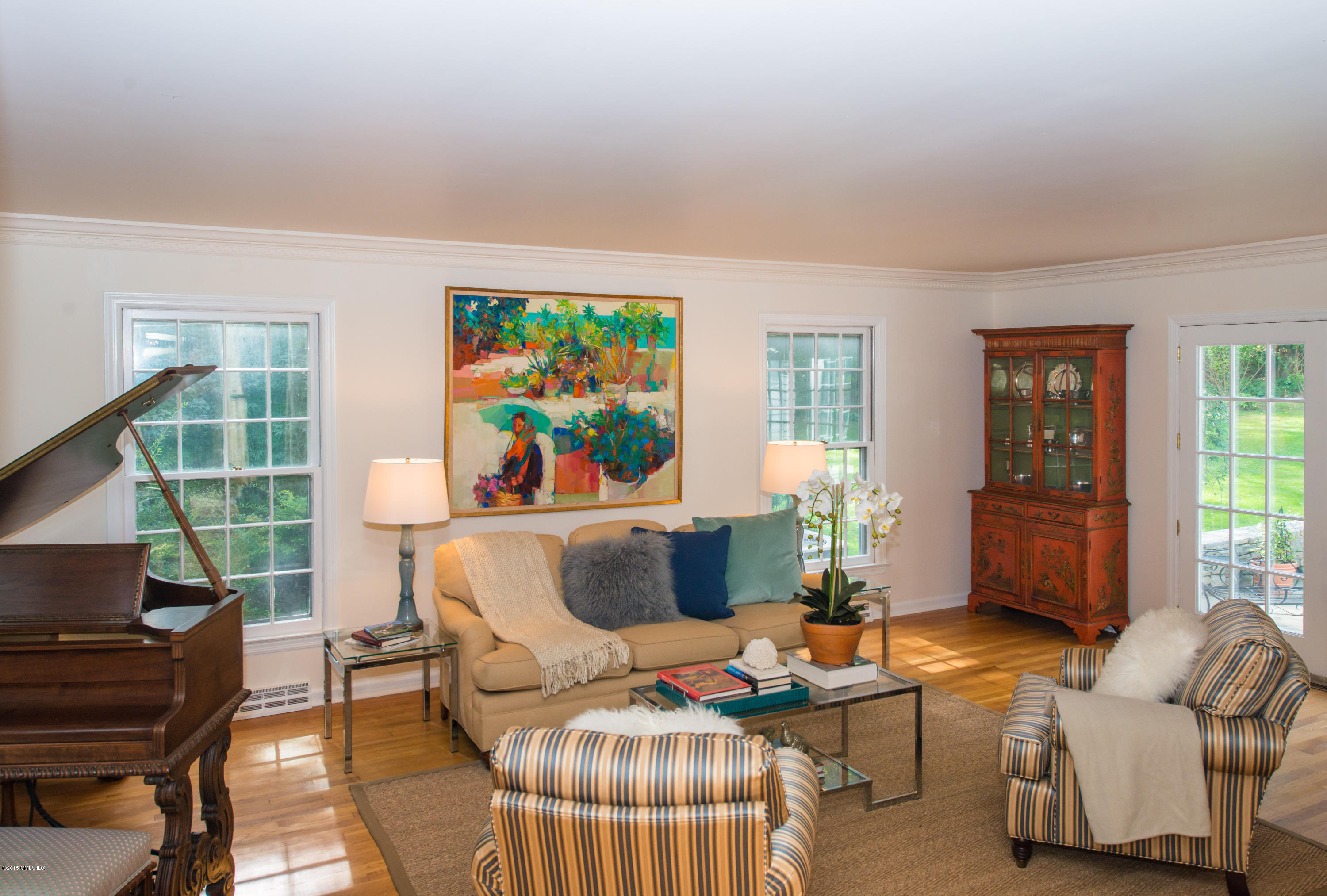 82 Butternut Hollow Road Greenwich, CT 06830 - Photo 4 of 29 a living room with furniture and a flat screen tv