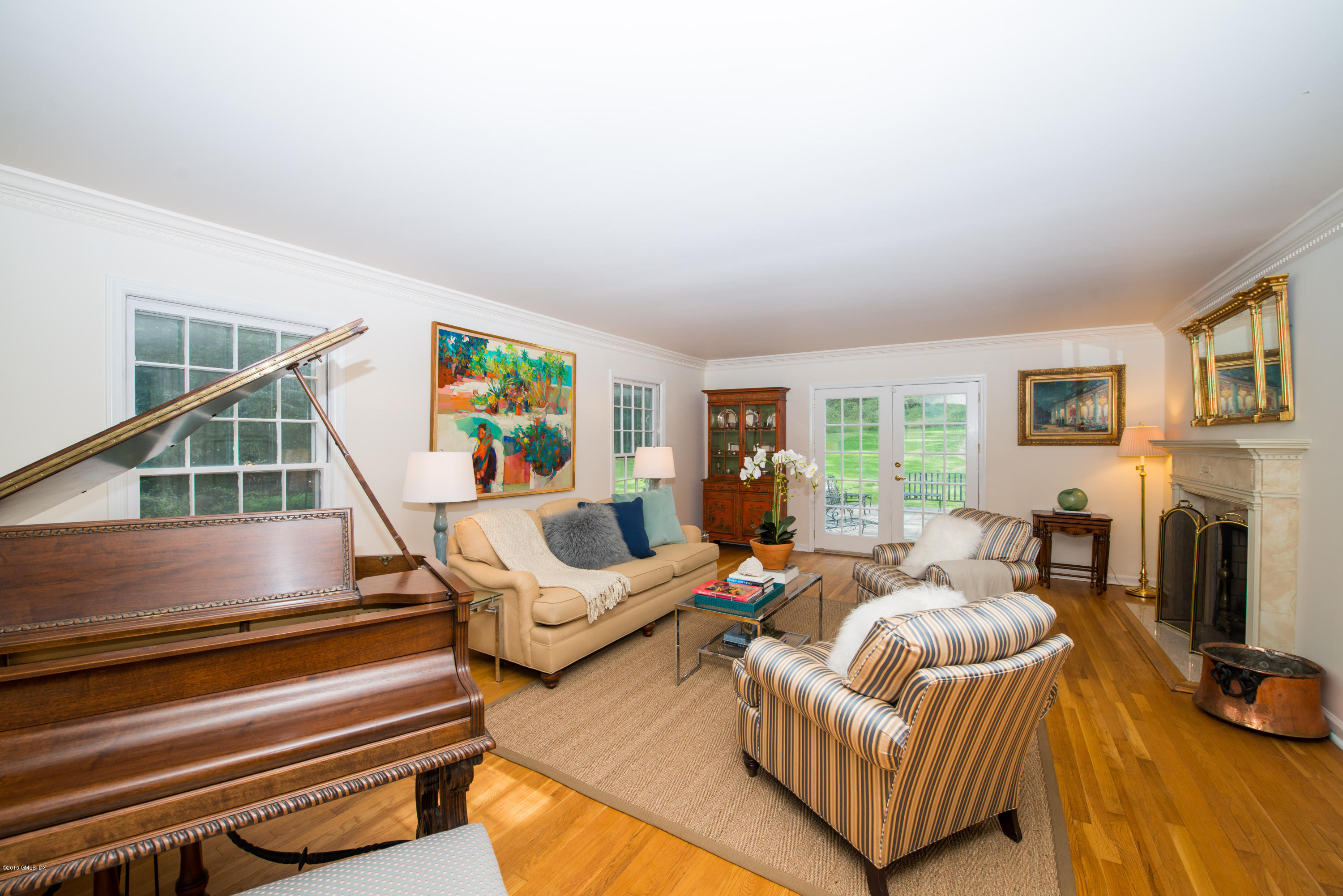 82 Butternut Hollow Road Greenwich, CT 06830 - Photo 5 of 29 a living room with furniture fireplace and a window