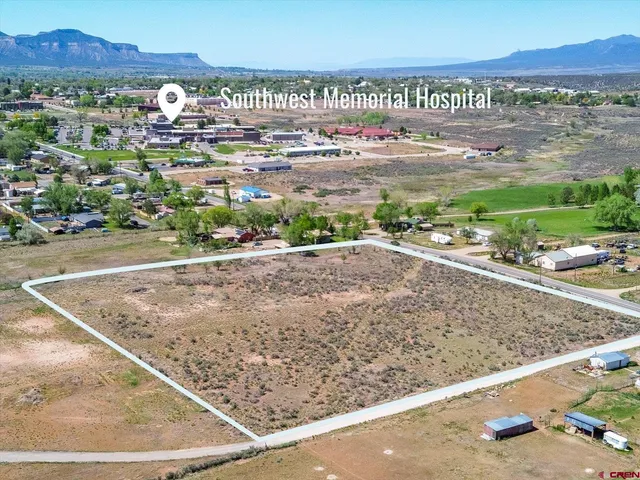 a view of a street with a ocean view