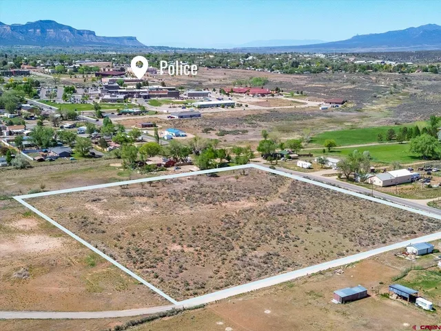 a view of a city with mountain
