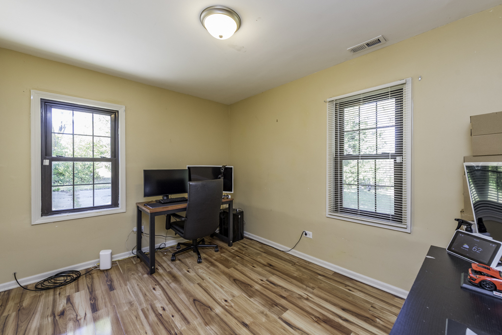 1700 Gideon Avenue Zion, IL 60099 - Photo 26 of 33 a view of a workspace with furniture and a window