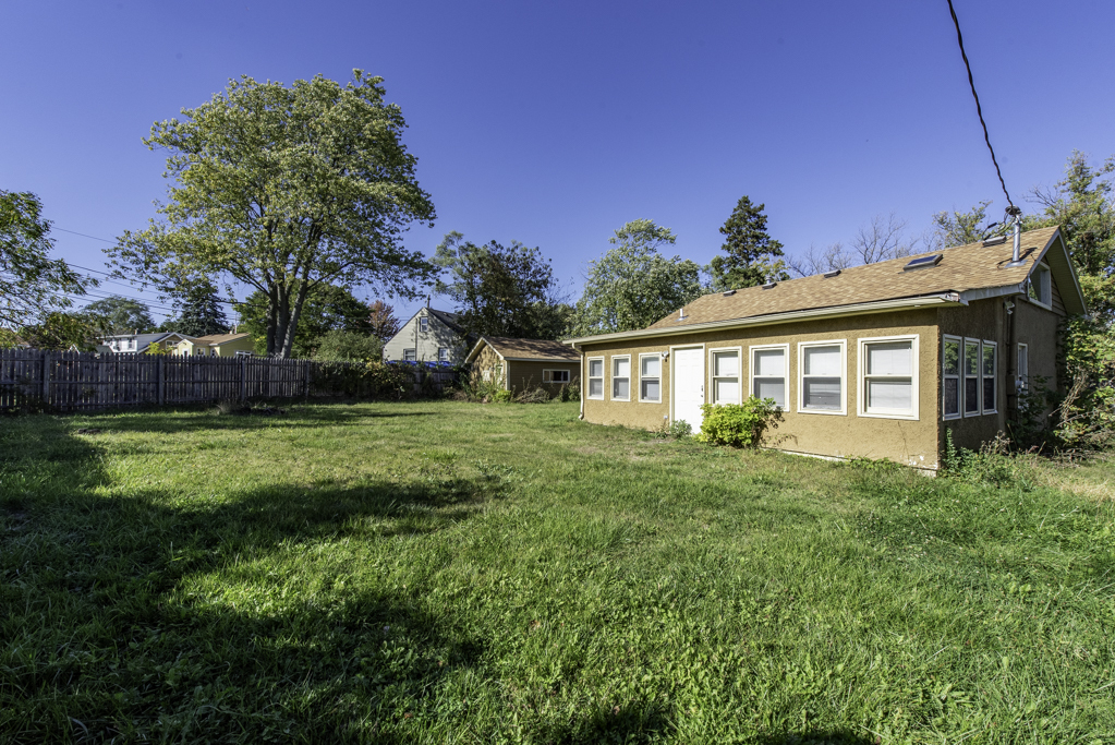 1700 Gideon Avenue Zion, IL 60099 - Photo 32 of 33 a view of a house with a backyard