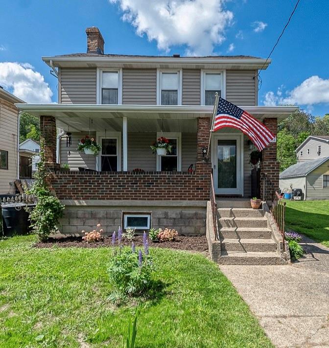 6132 Noblestown Road Oakdale, PA 15071 - Photo 1 of 23 a front view of a house with garden