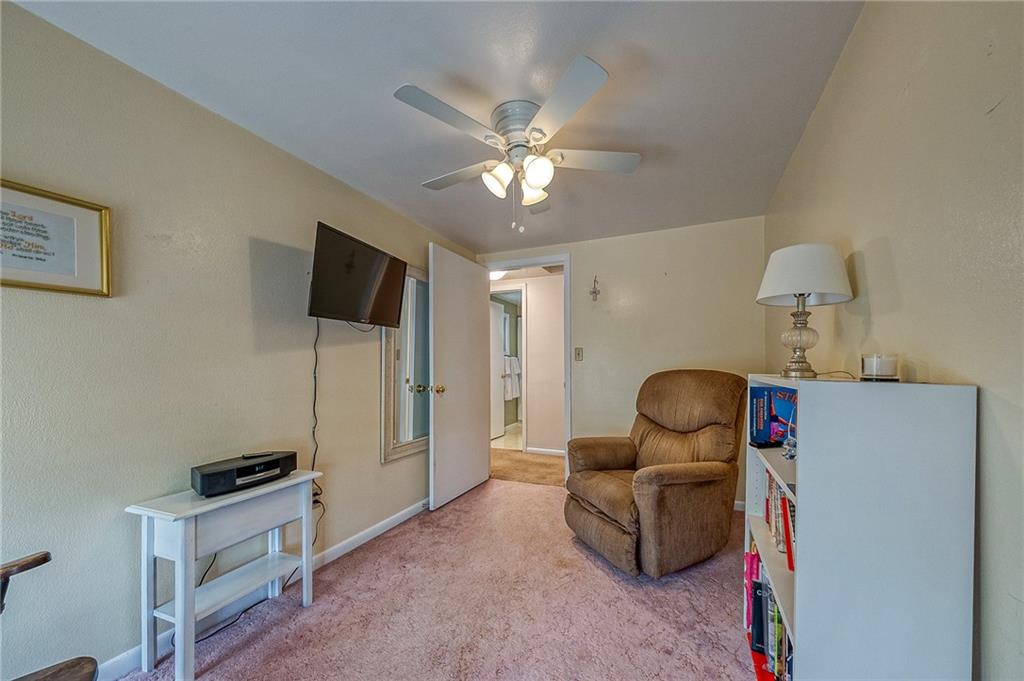 6132 Noblestown Road Oakdale, PA 15071 - Photo 21 of 23 a living room with furniture and a flat screen tv