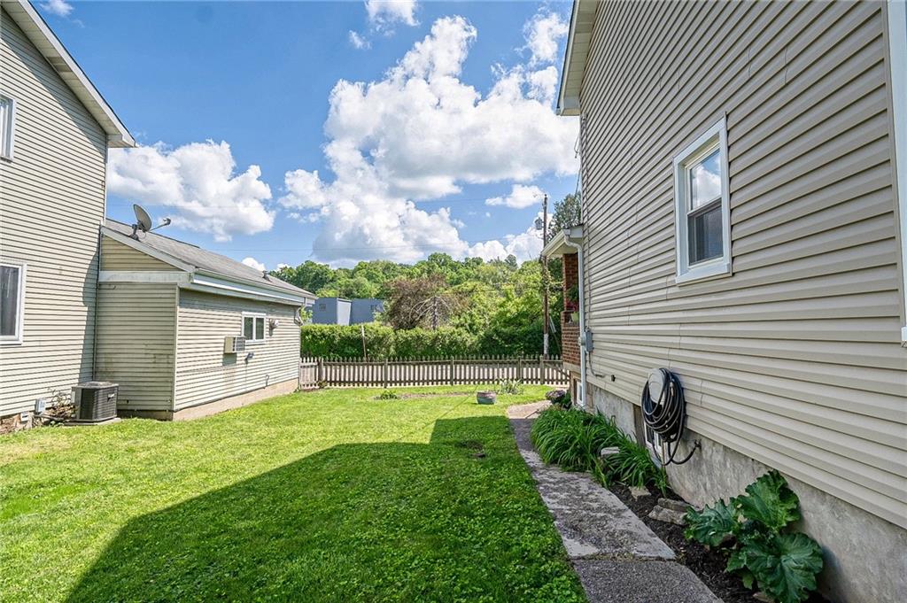 6132 Noblestown Road Oakdale, PA 15071 - Photo 5 of 23 a backyard of a house with lots of green space