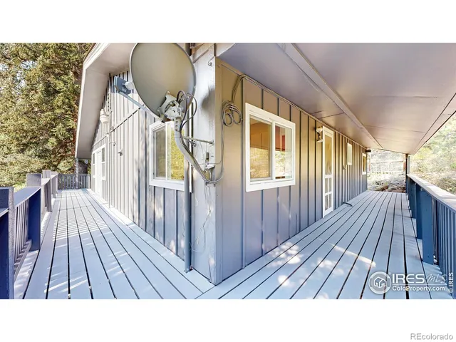 a open area with green field and trees