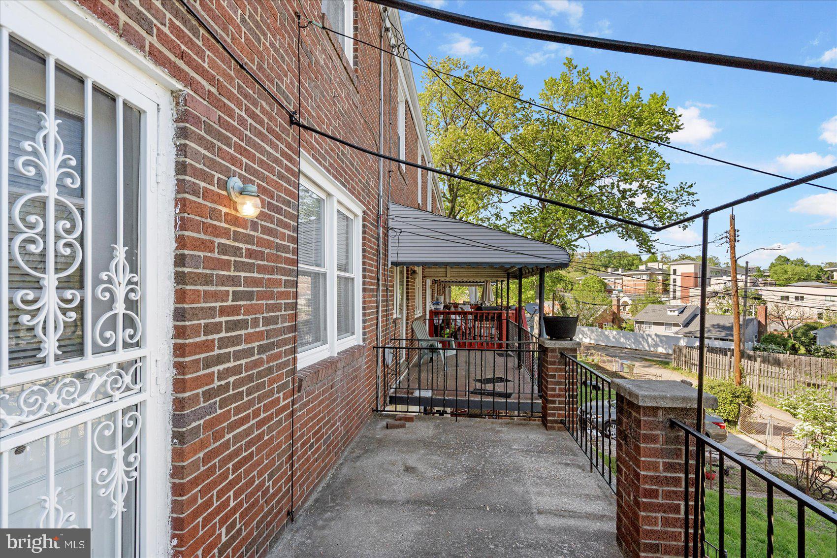 3809 Monterey Road Baltimore, MD 21218 - Photo 30 of 38 a view of a porch with furniture