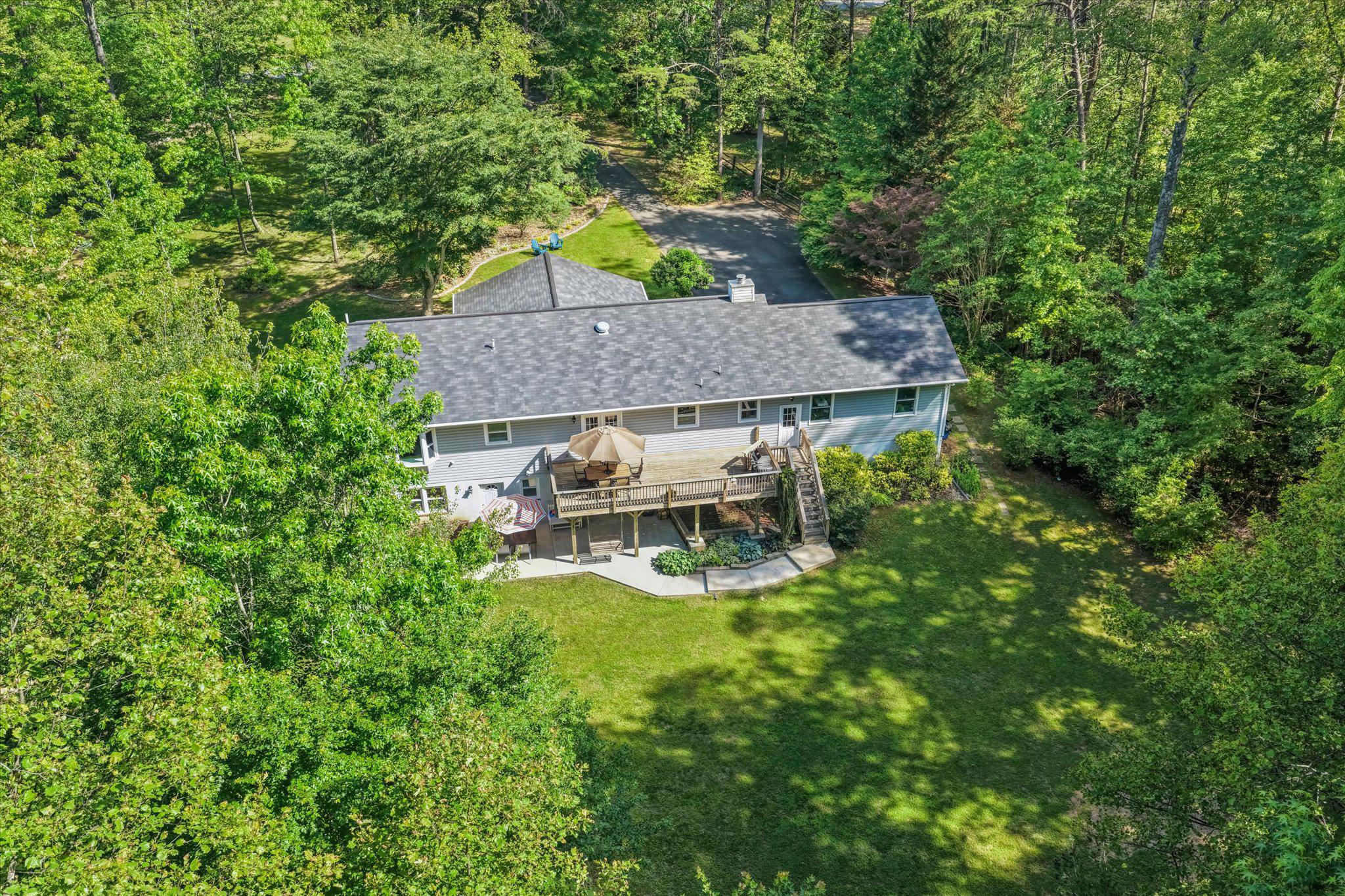 230 Richards Ferry Road Fredericksburg, VA 22406 - Photo 63 of 96 Serene home nestled in lush greenery.