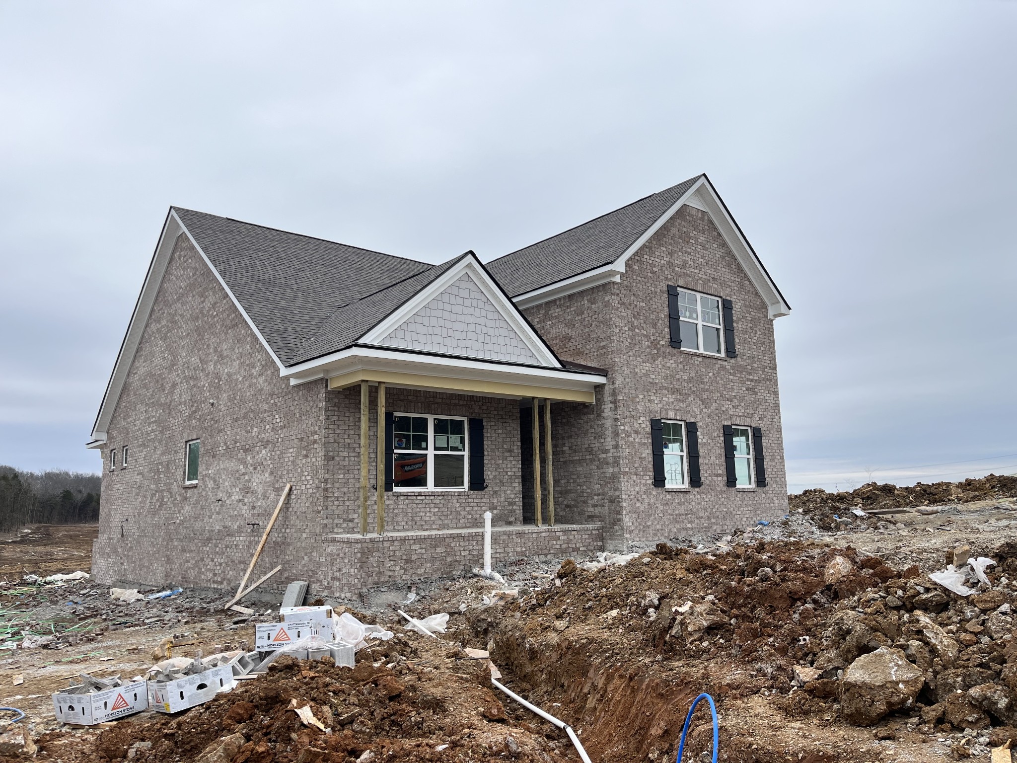 613 Spring Hill Drive Smyrna, TN 37167 - Photo 4 of 25 a front view of a house with a yard