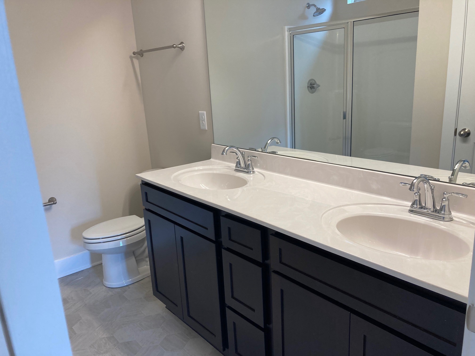 613 Spring Hill Drive Smyrna, TN 37167 - Photo 8 of 25 a bathroom with a granite countertop sink a toilet and a mirror