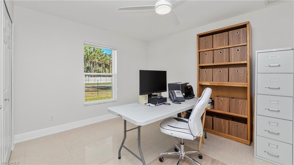 1580 16th Street Northeast Naples, FL 34120 - Photo 23 of 50 a view of a workspace with furniture
