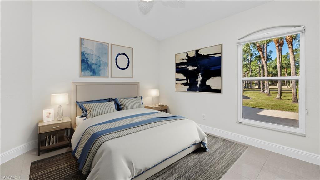 1580 16th Street Northeast Naples, FL 34120 - Photo 29 of 50 a bedroom with a bed and window
